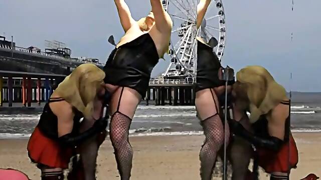 Mrs. Samantha spanks and teases transsexual slave Marina chained to the ceiling