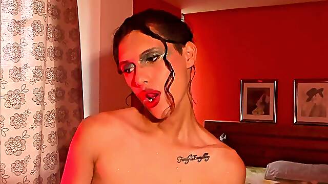 Magnificent femboy with her luxurious face and sensitive figure. her make-up makes her sight like...