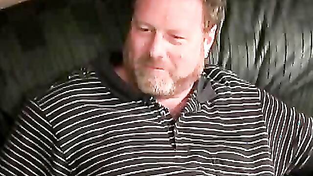 Bearded mature bear plays with his fat shaft and shoots cum