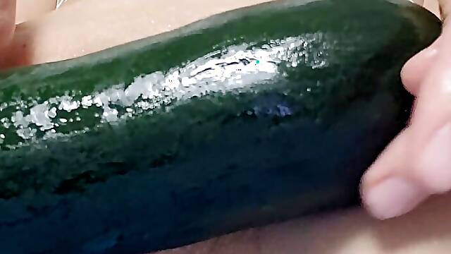 Masturbation of lightly pumped pussy with zucchini 