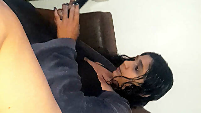 Busty Indian MILF gives hubby a footjob