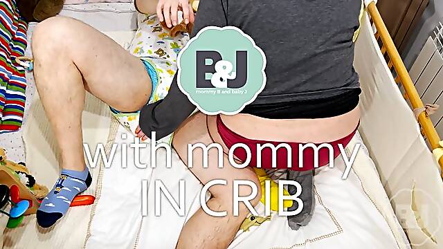With mommy in crib