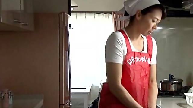 Hisae Yabe moans while fingering her hairy pussy in the bathroom