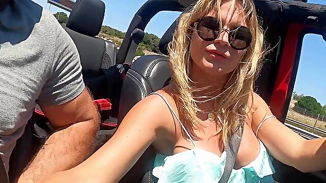 German amateur milf does public blowjob in the car while driving