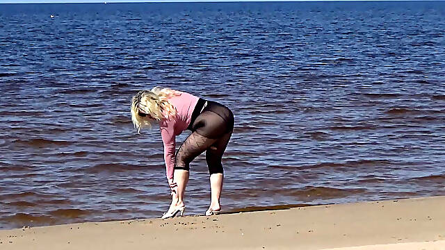 Funny MILF with Nylon Ass and Tits on Beach