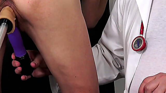 Sexy MILF gets squirting orgasm in gyno chair