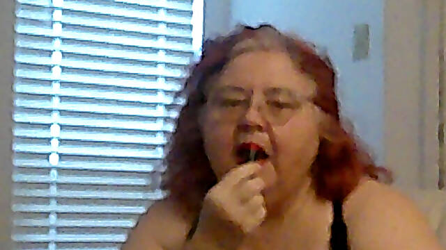 Mature BBW Redhead Nurse Vicki Talks to You as She Makes a Lipstick Applying Video for You!