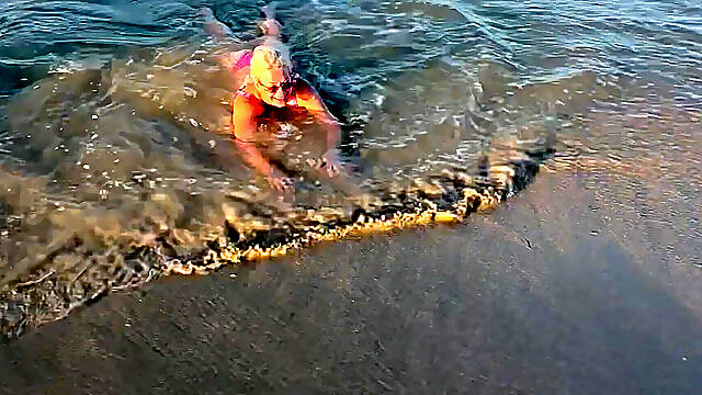 Try Not to Wet My Hair While Play with the Waves